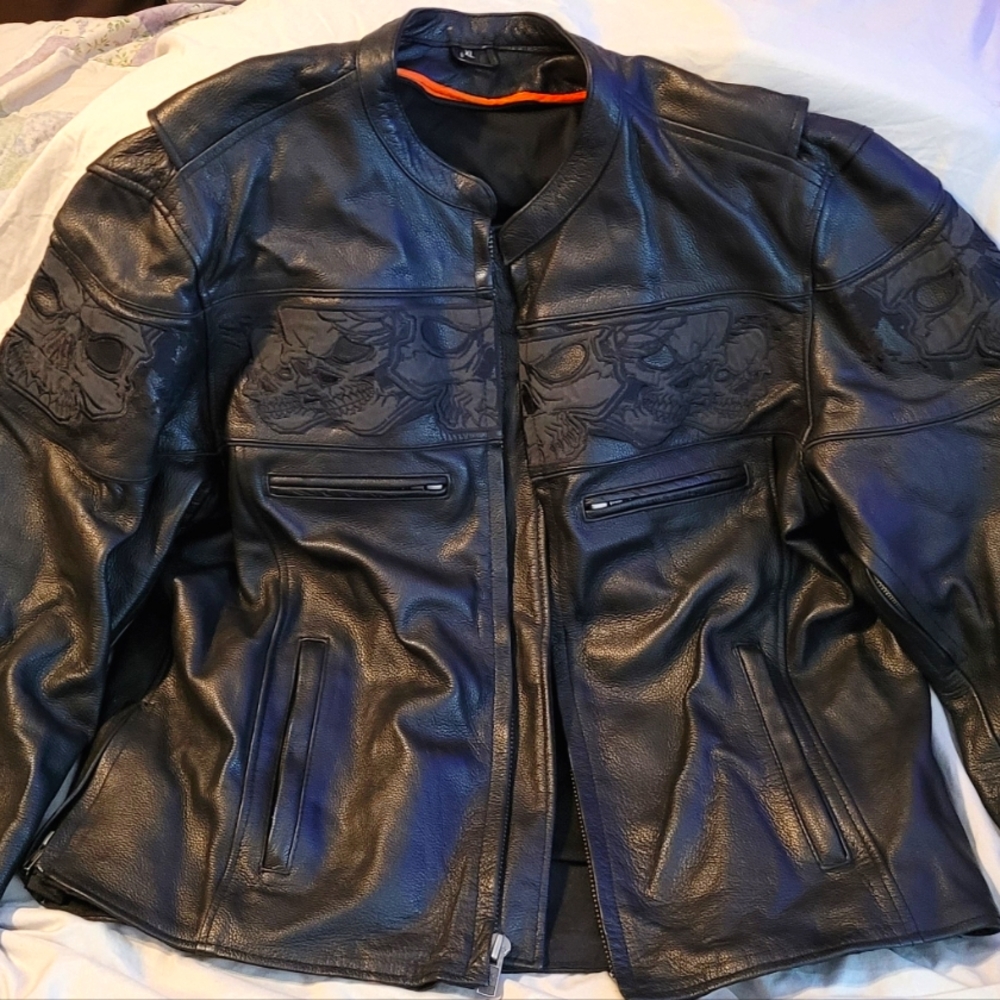 Genuine leather motorcycle riding jacket XL but could fit an XXL too